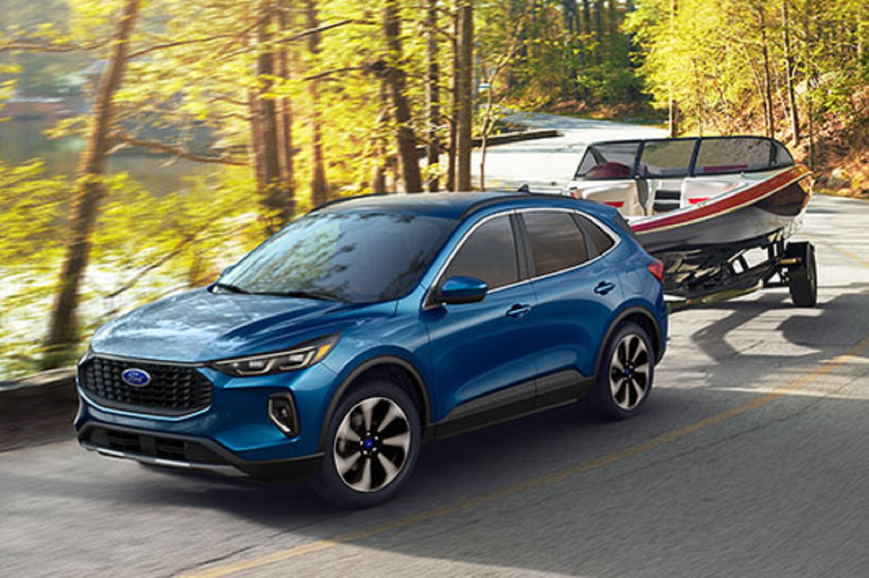Blue Ford Escape Towing a Boat